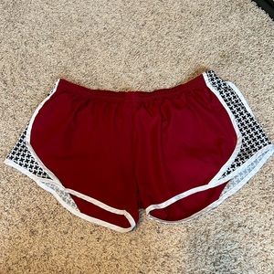 Soffe athletic running shorts. Dry-fit material with a drawstring.